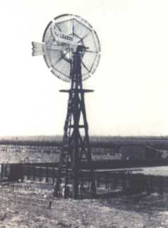 Original photograph of an early day windmill of West Texas